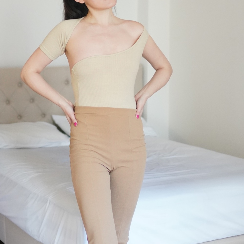 Neutral one shoulder top.